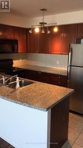 #1911 -4889 Kimbermount Ave, Mississauga, ON - Indoor Photo Showing Kitchen With Double Sink