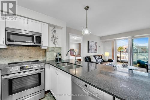 #206 -7730 Kipling Ave, Vaughan, ON - Indoor Photo Showing Kitchen With Stainless Steel Kitchen With Double Sink With Upgraded Kitchen