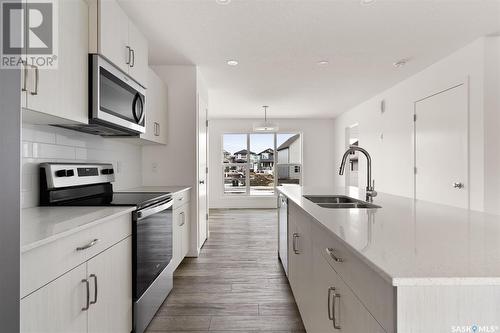 3082 Bellegarde Crescent, Regina, SK - Indoor Photo Showing Kitchen With Double Sink With Upgraded Kitchen