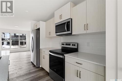 3082 Bellegarde Crescent, Regina, SK - Indoor Photo Showing Kitchen With Stainless Steel Kitchen