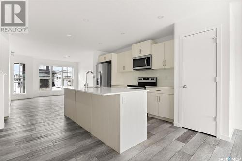 3082 Bellegarde Crescent, Regina, SK - Indoor Photo Showing Kitchen With Stainless Steel Kitchen With Upgraded Kitchen