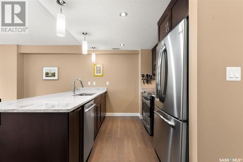 103 2300 Broad Street, Regina, SK - Indoor Photo Showing Kitchen With Stainless Steel Kitchen With Double Sink