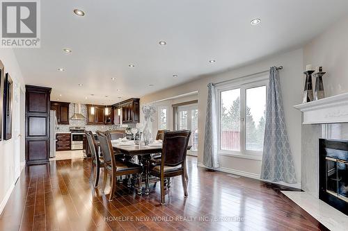 233 Brimson Dr, Newmarket, ON - Indoor Photo Showing Dining Room With Fireplace
