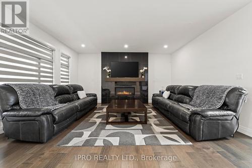 222 Cowan Court, Amherstburg, ON - Indoor Photo Showing Living Room With Fireplace