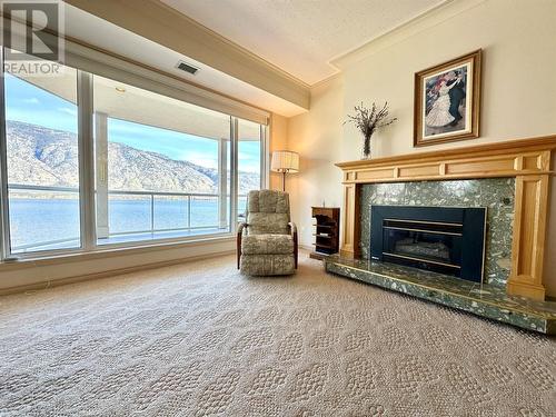 7805 Spartan Drive Unit# 203, Osoyoos, BC - Indoor Photo Showing Living Room With Fireplace