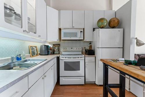 30 Jones Street, Hamilton, ON - Indoor Photo Showing Kitchen With Double Sink