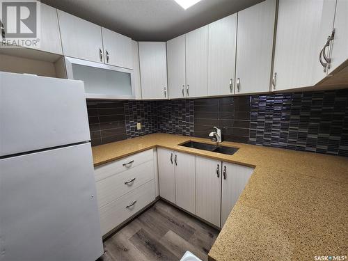 203 525 Dufferin Avenue, Estevan, SK - Indoor Photo Showing Kitchen With Double Sink
