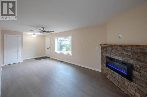 1815 Fairford Drive, Penticton, BC - Indoor Photo Showing Living Room With Fireplace