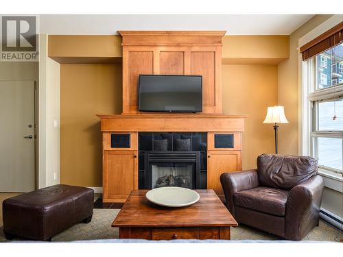 170 Silver Lode Lane Unit# 409, Silver Star, BC - Indoor Photo Showing Living Room With Fireplace