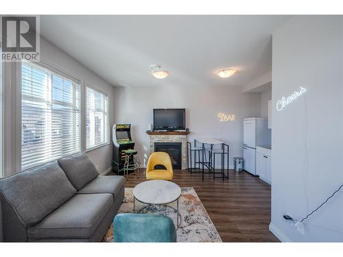 2450 Radio Tower Road Unit# 271, Oliver, BC - Indoor Photo Showing Living Room With Fireplace