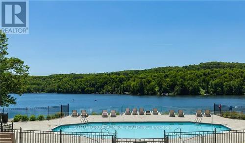 #425 -25 Pen Lake Point Rd, Huntsville, ON - Outdoor With Body Of Water With In Ground Pool