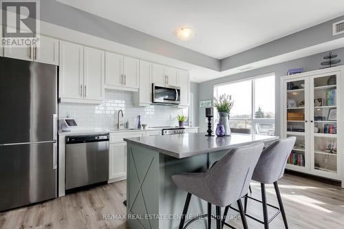 #301 -247 Northfield Dr E, Waterloo, ON - Indoor Photo Showing Kitchen With Stainless Steel Kitchen With Upgraded Kitchen