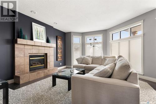 5070 Wascana Vista Court, Regina, SK - Indoor Photo Showing Living Room With Fireplace