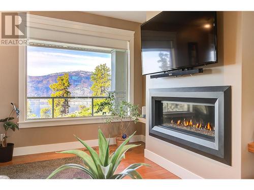 1788 Shayler Place, Kelowna, BC - Indoor Photo Showing Other Room With Fireplace