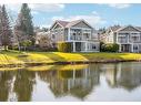 1395 Saturna Dr, Parksville, BC  - Outdoor With Body Of Water With Deck Patio Veranda With Facade 
