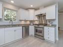 568 Hazelwood Pl, Qualicum Beach, BC  - Indoor Photo Showing Kitchen With Double Sink 