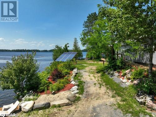 2475 Alf'S Bay Lane, Arden, ON - Outdoor With Body Of Water With View