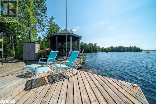 2475 Alf'S Bay Lane, Arden, ON - Outdoor With Body Of Water With Deck Patio Veranda