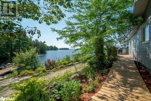 2475 Alf'S Bay Lane, Arden, ON - Outdoor With Body Of Water