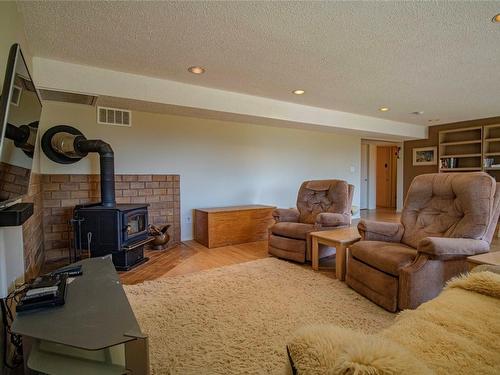 174 Spruce Place, Penticton, BC - Indoor With Fireplace