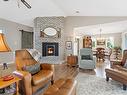 830 Redonda Pl, Qualicum Beach, BC  - Indoor Photo Showing Living Room With Fireplace 