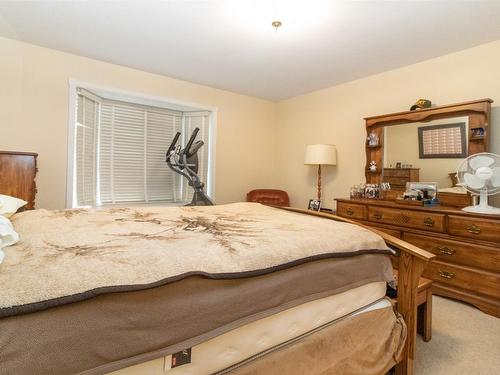 102-1321 Ridgeway Drive, Kelowna, BC - Indoor Photo Showing Bedroom