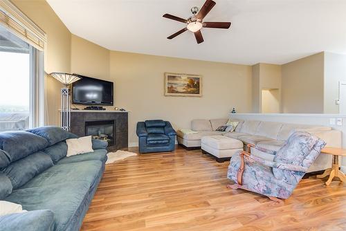 3-2421 Glacier Court, Kelowna, BC - Indoor Photo Showing Living Room With Fireplace