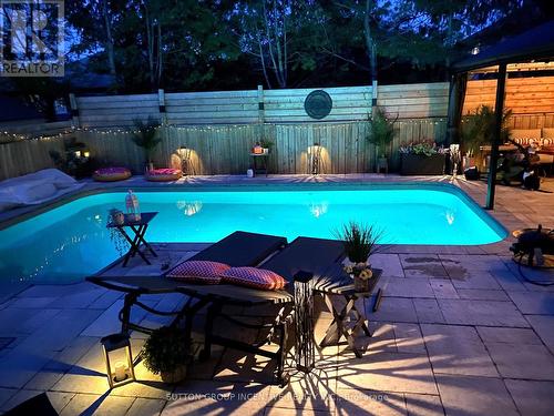 19 Mcavoy Dr, Barrie, ON - Outdoor With In Ground Pool With Backyard