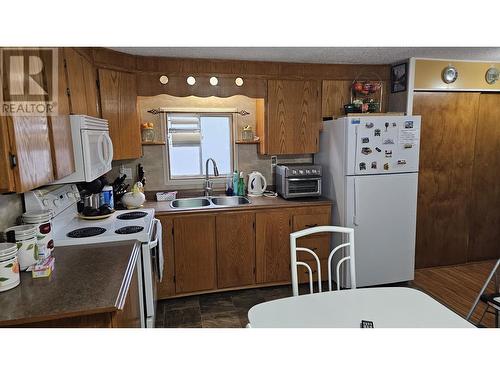 210 5130 North Nechako Road, Prince George, BC - Indoor Photo Showing Kitchen With Double Sink