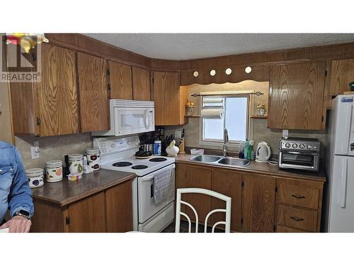 210 5130 North Nechako Road, Prince George, BC - Indoor Photo Showing Kitchen With Double Sink