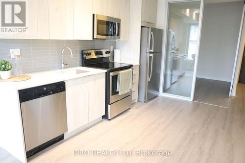 116 - 1350 Kingston Road, Toronto (Birchcliffe-Cliffside), ON - Indoor Photo Showing Kitchen With Stainless Steel Kitchen With Upgraded Kitchen