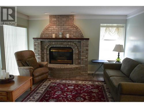308 Westland Road, Quesnel, BC - Indoor Photo Showing Living Room With Fireplace