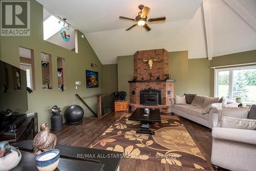 69 County Rd 121, Kawartha Lakes, ON - Indoor Photo Showing Living Room With Fireplace