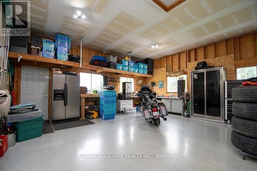 69 County Rd 121, Kawartha Lakes, ON - Indoor Photo Showing Garage