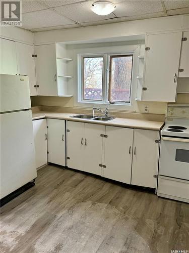 1450 Alexandra Street, Regina, SK - Indoor Photo Showing Kitchen With Double Sink