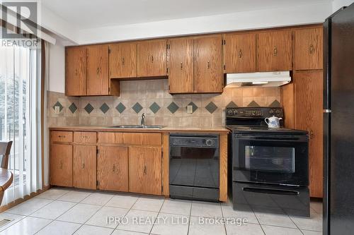 #12 -725 Vermouth Ave, Mississauga, ON - Indoor Photo Showing Kitchen With Double Sink