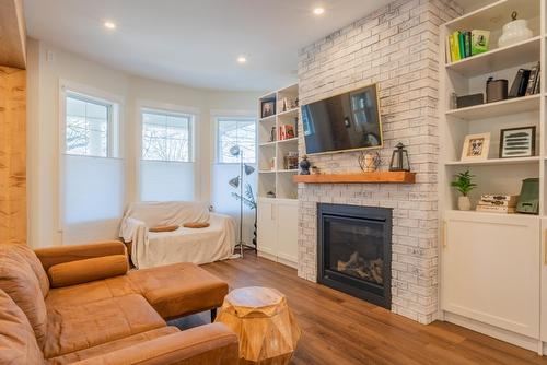 723 Hendryx Street, Nelson, BC - Indoor Photo Showing Living Room With Fireplace