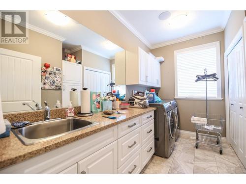 2450 Radio Tower Road Unit# 232, Osoyoos, BC - Indoor Photo Showing Laundry Room