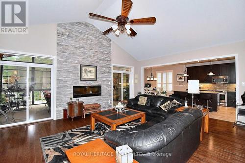 34 South Harbour Drive, Kawartha Lakes, ON - Indoor Photo Showing Living Room With Fireplace
