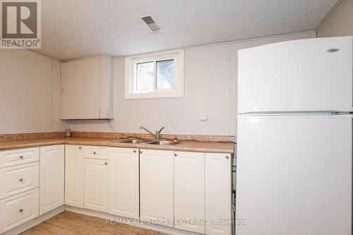 30 Dominion Drive, Kawartha Lakes, ON - Indoor Photo Showing Kitchen With Double Sink