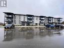 #301 -30 Hillside Meadow Dr, Quinte West, ON  - Outdoor With Balcony With Facade 