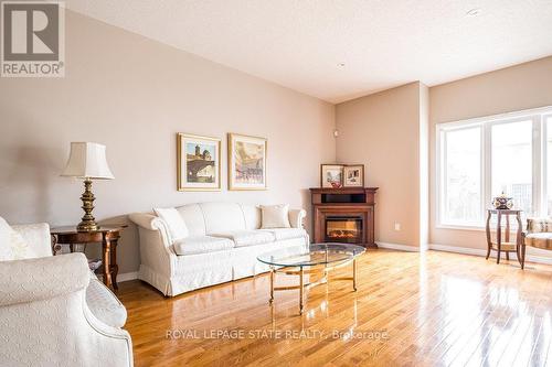 522 Stonehenge Dr, Hamilton, ON - Indoor Photo Showing Living Room With Fireplace