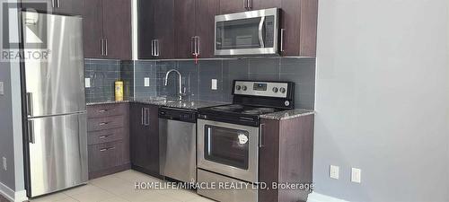 1301 - 840 Queen'S Plate Drive, Toronto, ON - Indoor Photo Showing Kitchen With Upgraded Kitchen
