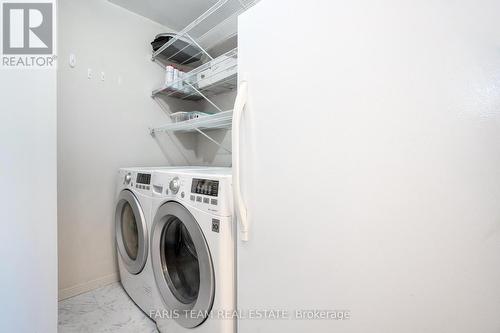 #1704 -75 Ellen St, Barrie, ON - Indoor Photo Showing Laundry Room