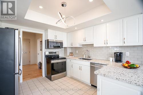 #1704 -75 Ellen St, Barrie, ON - Indoor Photo Showing Kitchen With Upgraded Kitchen