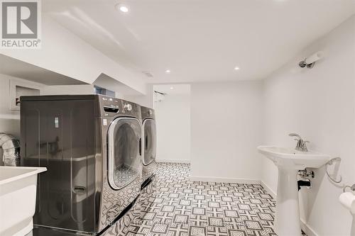 117 Pape Avenue, Toronto, ON - Indoor Photo Showing Laundry Room