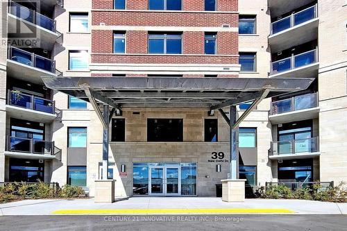 507 - 39 New Delhi Drive, Markham, ON - Outdoor With Balcony With Facade