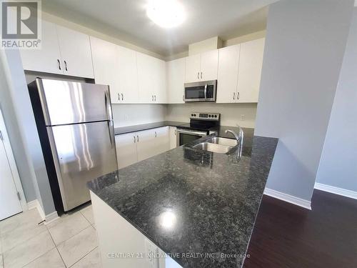 #507 -39 New Delhi Dr, Markham, ON - Indoor Photo Showing Kitchen With Stainless Steel Kitchen With Double Sink
