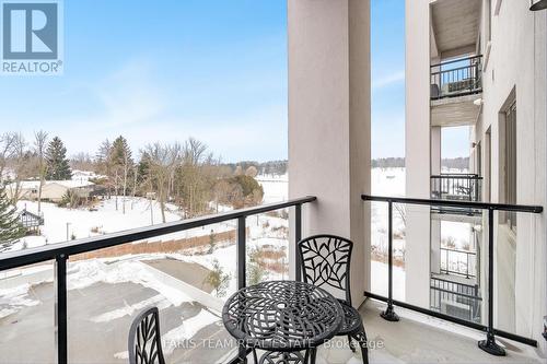 #406 -64 Queen St S, New Tecumseth, ON - Outdoor With Balcony