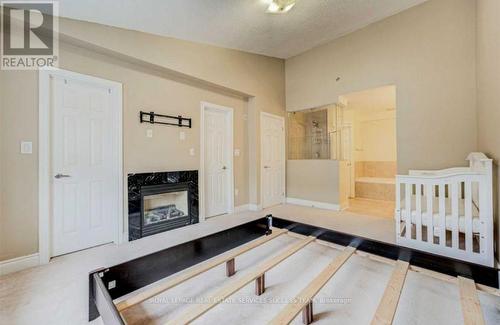 #26 -8 Brighton Pl, Vaughan, ON - Indoor Photo Showing Other Room With Fireplace